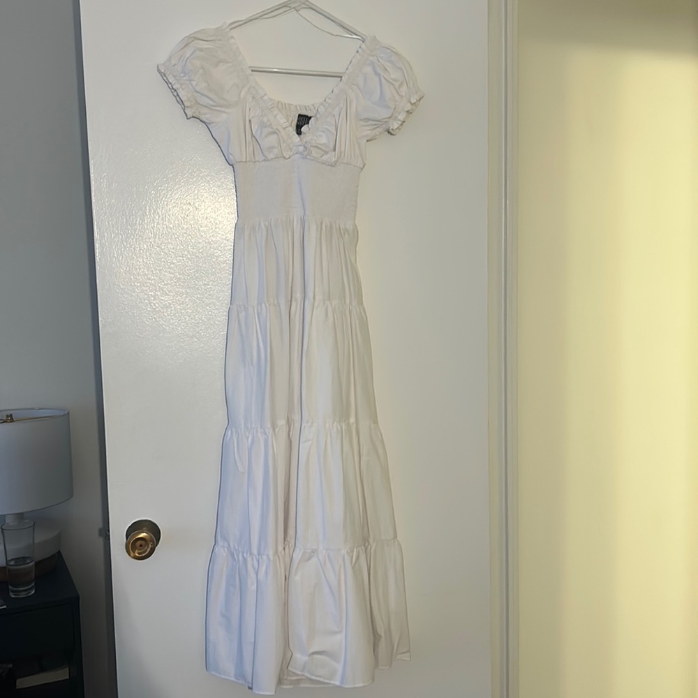 we wore what white dress, size XS. Never worn.